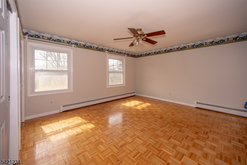 105 Valley Road Wantage, NJ 07461 - Photo 21 of 32 a view of an empty room and window