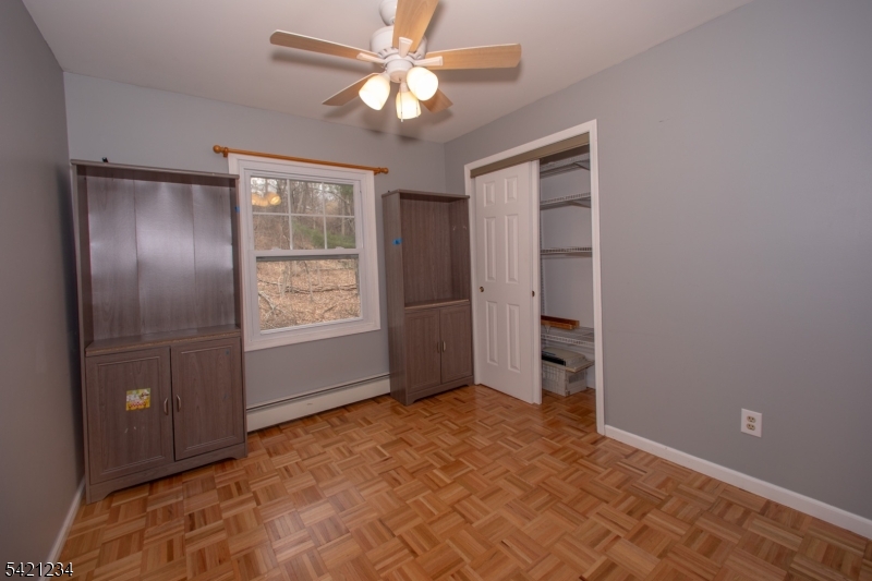 105 Valley Road Wantage, NJ 07461 - Photo 22 of 32 a view of an empty room with a window