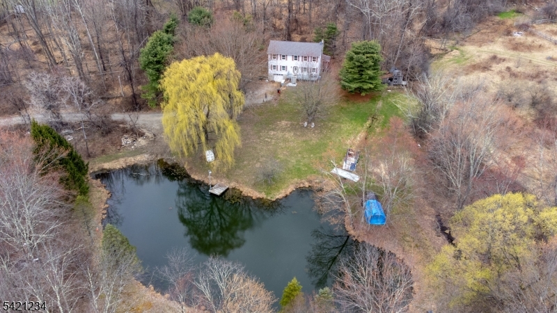 105 Valley Road Wantage, NJ 07461 - Photo 32 of 32 an aerial view of a house with a yard