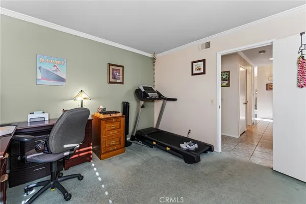 a view of a workspace with gym equipment