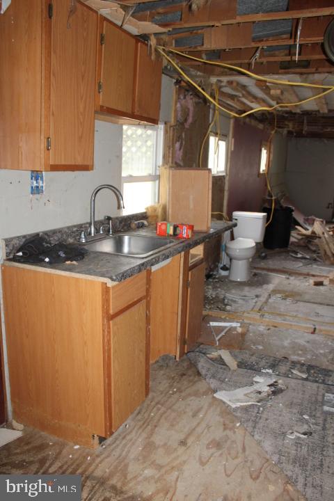 1234 Baltimore Street, Unit 4 Hanover, PA 17331 - Photo 7 of 9 a kitchen with a sink and cabinets
