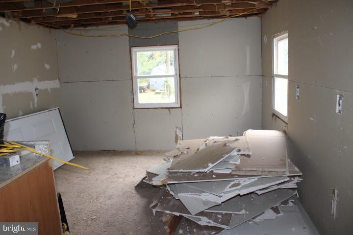 1234 Baltimore Street, Unit 4 Hanover, PA 17331 - Photo 8 of 9 a room with a table and a window