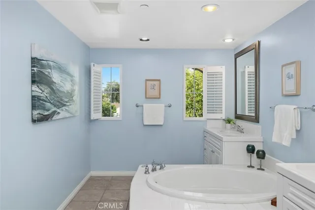a bathroom with a sink and a bathtub