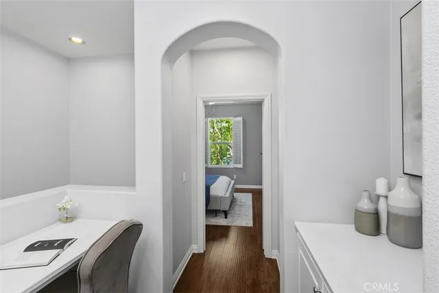 a en suite bathroom with a toilet sink and mirror