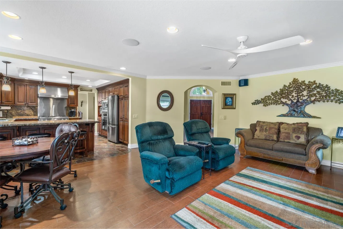 9342 Parus Point San Diego, CA 92129 - Photo 11 of 44 a living room with furniture and a rug