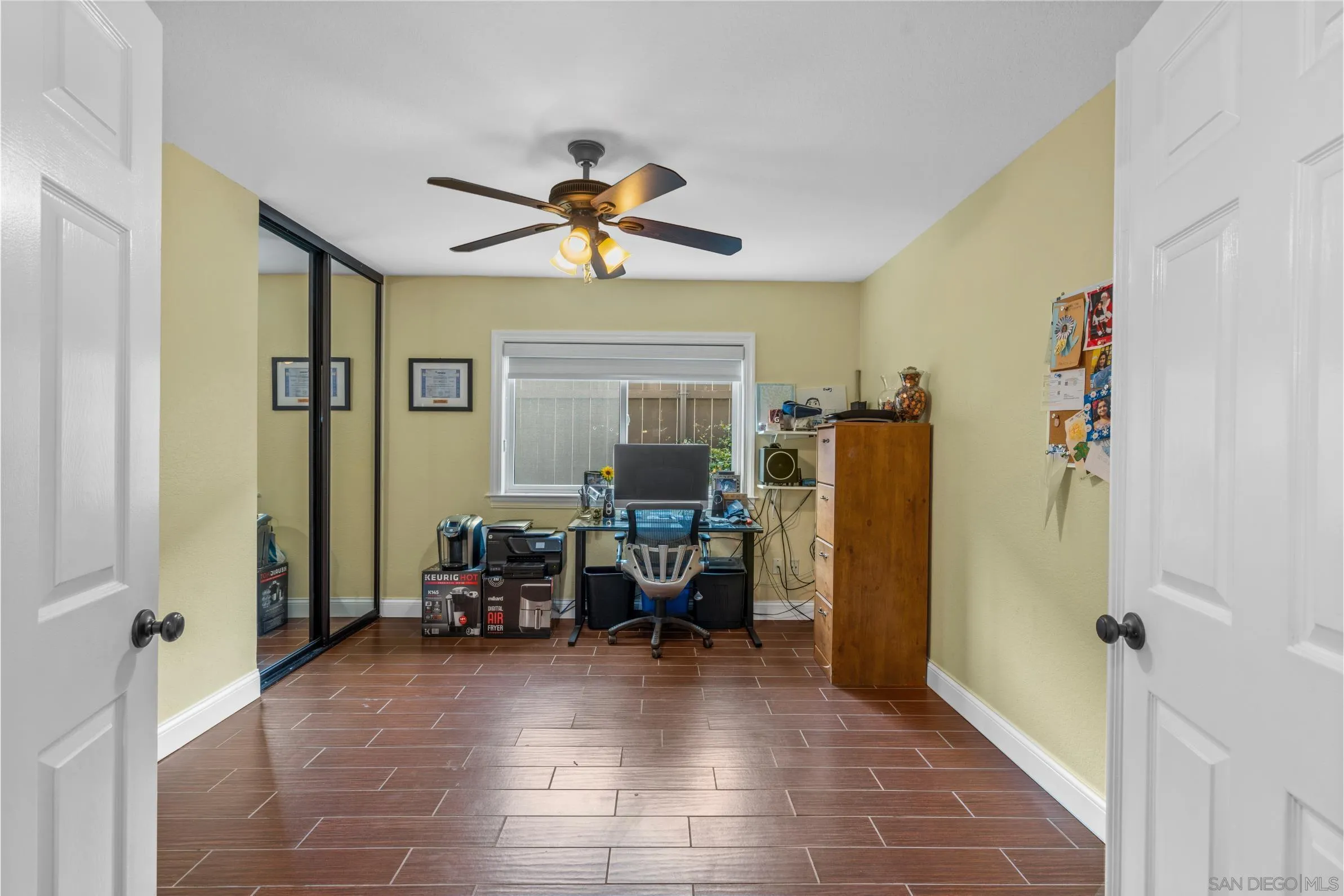 9342 Parus Point San Diego, CA 92129 - Photo 13 of 44 a view of a livingroom with furniture and a window