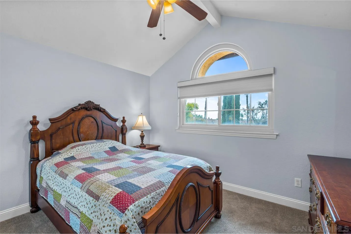 9342 Parus Point San Diego, CA 92129 - Photo 25 of 44 a bedroom with a bed and a window