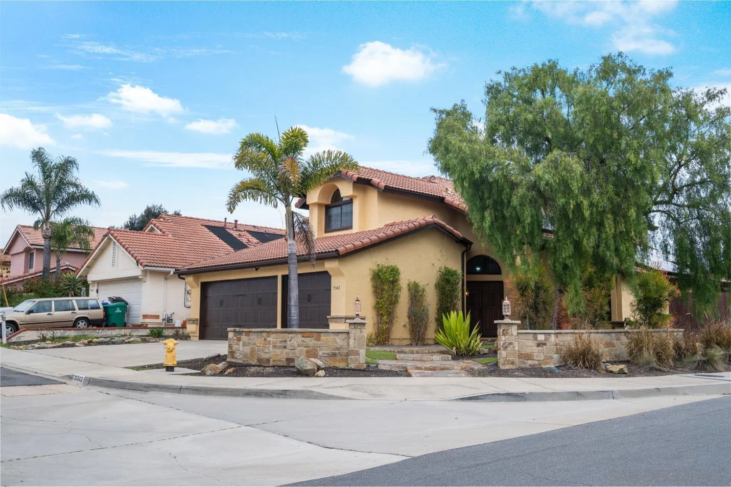 9342 Parus Point San Diego, CA 92129 - Photo 27 of 44 a front view of a house with a garden