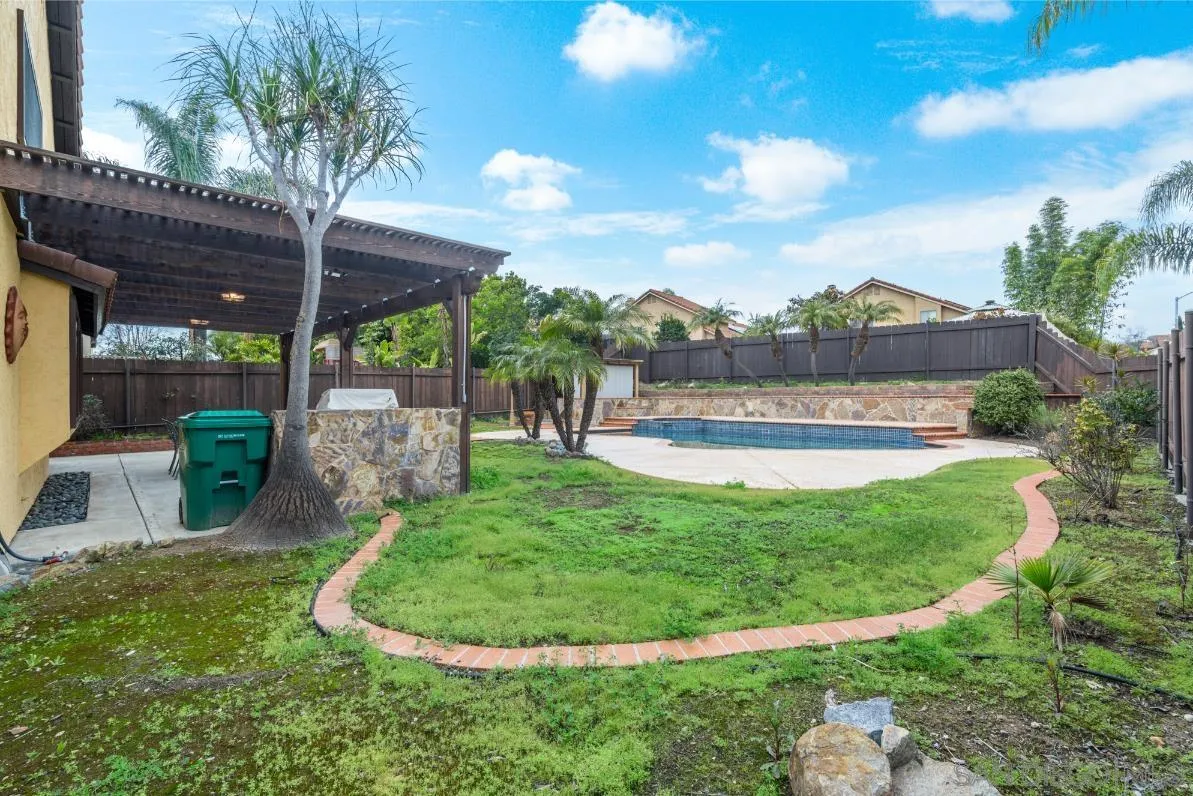 9342 Parus Point San Diego, CA 92129 - Photo 29 of 44 a view of a swimming pool with a patio