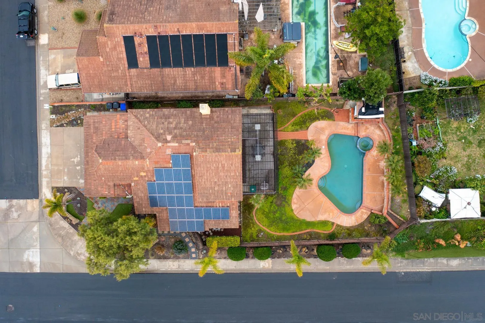 9342 Parus Point San Diego, CA 92129 - Photo 36 of 44 an aerial view of a house with a swimming pool and outdoor space