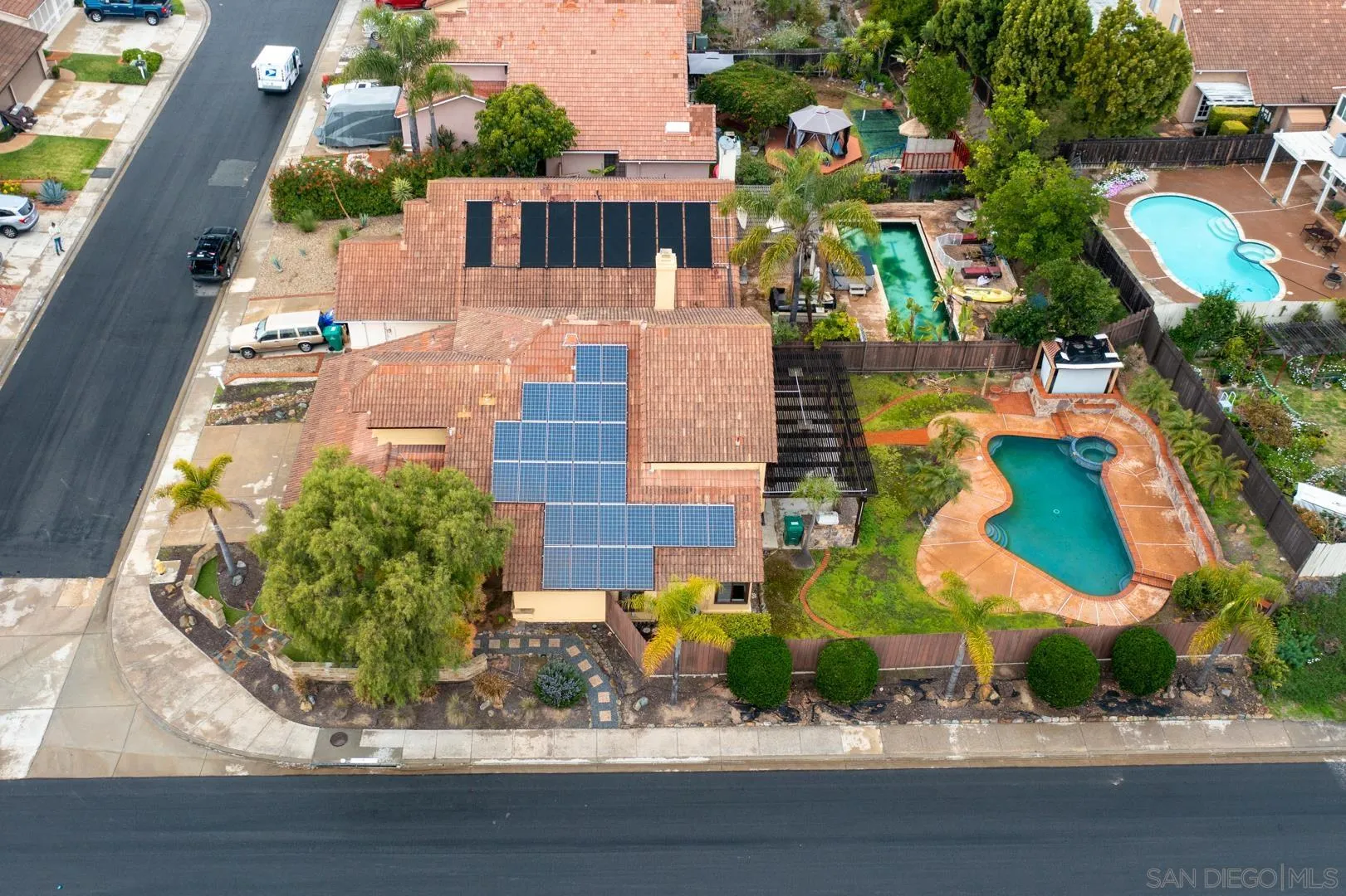 9342 Parus Point San Diego, CA 92129 - Photo 37 of 44 an aerial view of multiple houses with yard