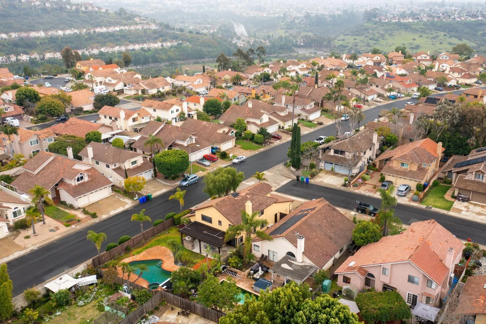 9342 Parus Point San Diego, CA 92129 - Photo 43 of 44 an aerial view of residential houses with outdoor space