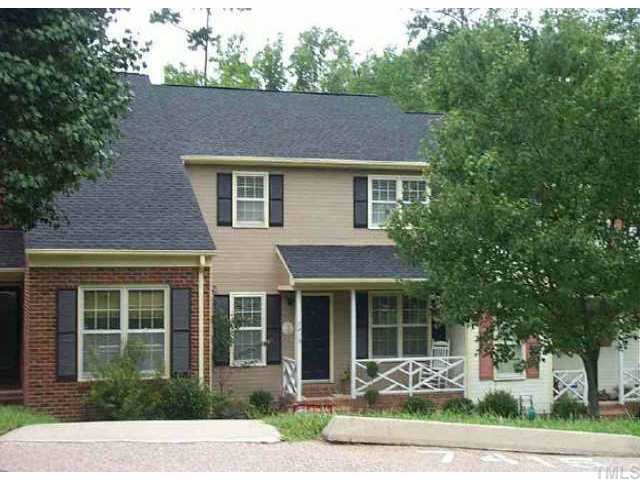 7415 Ashbury Court Raleigh, NC 27615 - Photo 1 of 1 a front view of a house with a yard