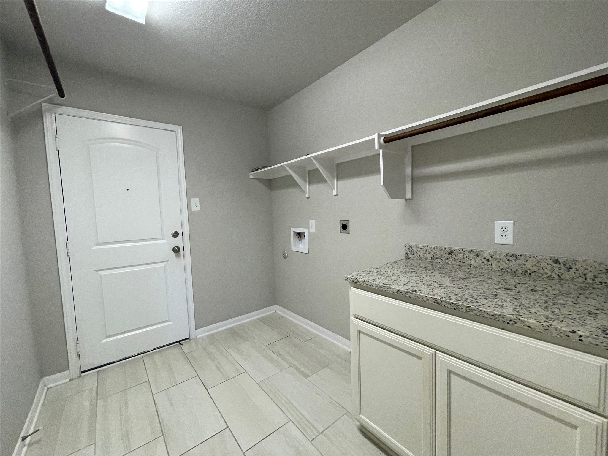 8113 Northgate Loop Temple, TX 76502 - Photo 29 of 35 Utility room featuring a light gray wall color