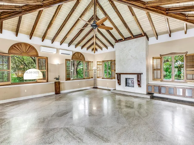 a view of an entryway with a fireplace