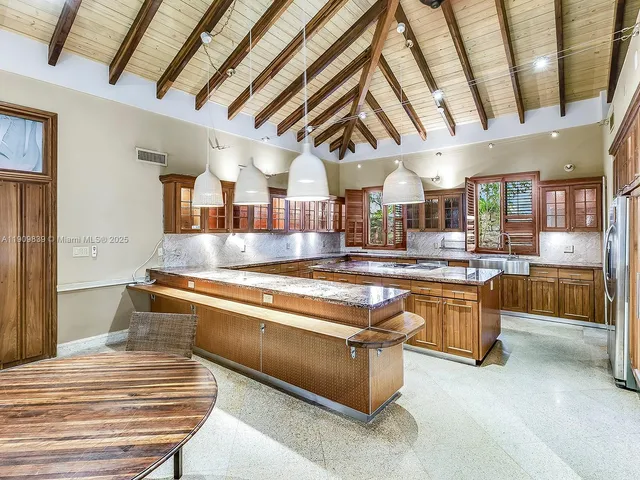a spacious bathroom with a large tub and sink