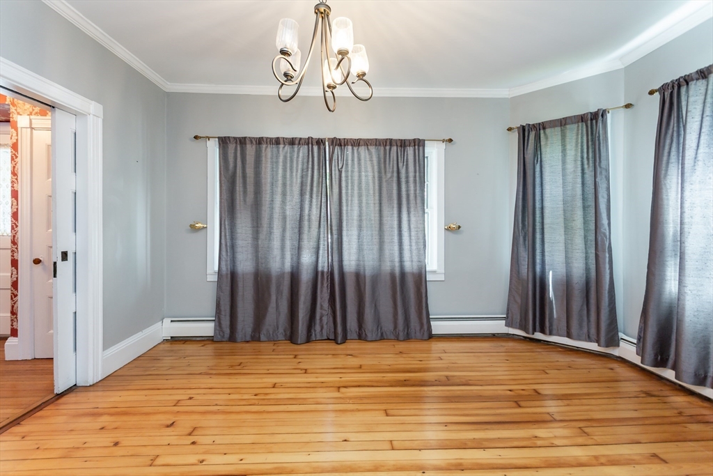 724 High Street Fall River, MA 02720 - Photo 12 of 39 a view of empty room with wooden floor