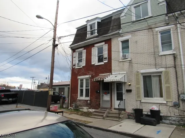 a view of a building with sitting area