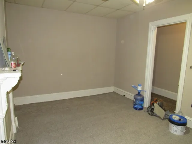 a kitchen with sink cabinets and window