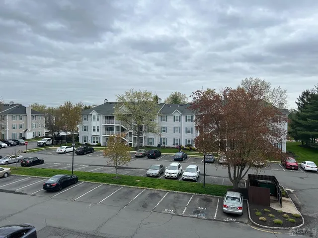 a view of a street with cars
