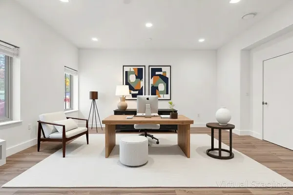 a living room with furniture and wooden floor