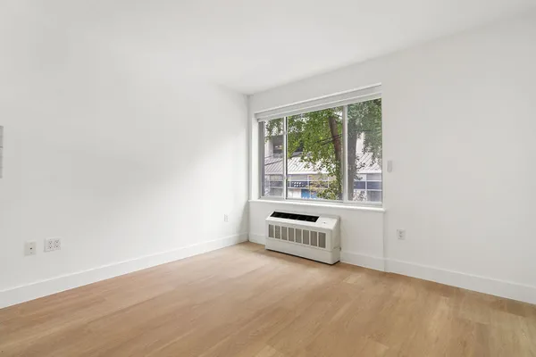 an empty room with windows