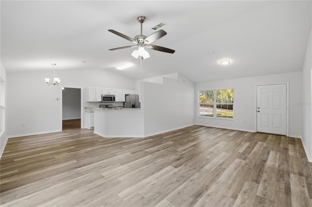 14185 Southwest 28th Lane Ocala, FL 34481 - Photo 3 of 12 a view of a kitchen with a sink and a window