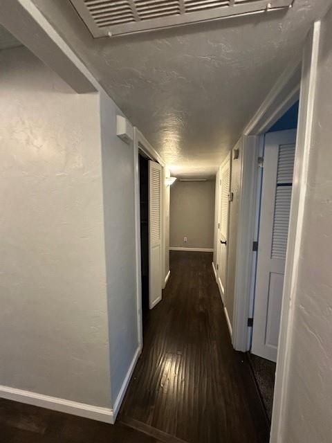 2550 4th Avenue Merced, CA 95340 - Photo 11 of 34 a view of a hallway with wooden floor