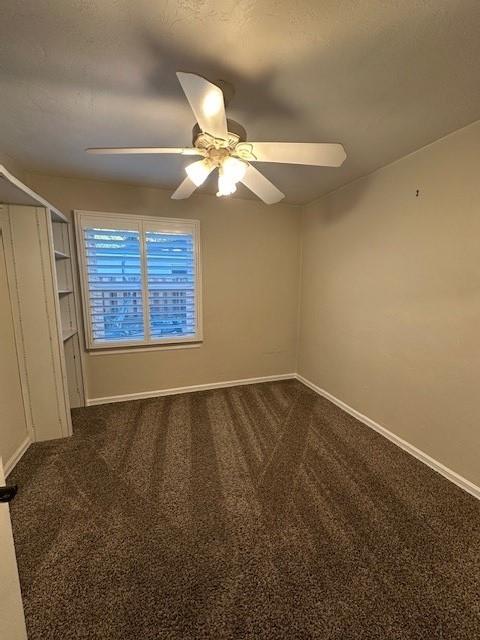2550 4th Avenue Merced, CA 95340 - Photo 14 of 34 en empty room with windows and ceiling fan
