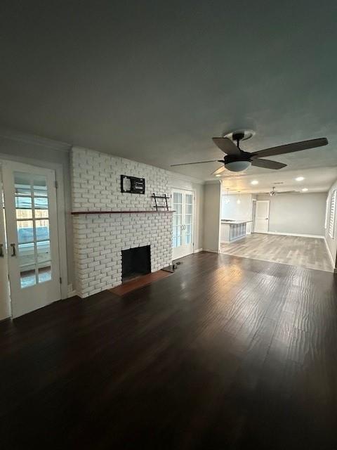 2550 4th Avenue Merced, CA 95340 - Photo 6 of 34 a view of empty room with wooden floor and fireplace