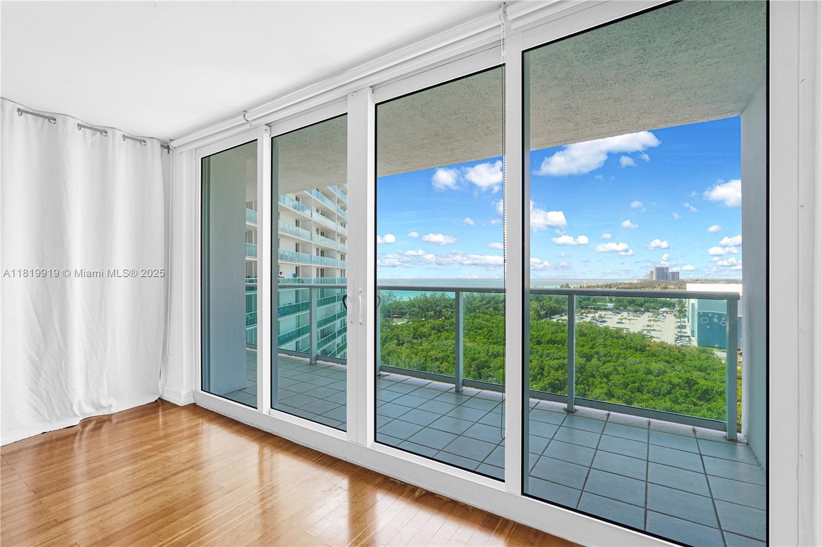 100 Bayview Drive, Unit 1223 Sunny Isles Beach, FL 33160 - Photo 14 of 34 a view of an empty room and window