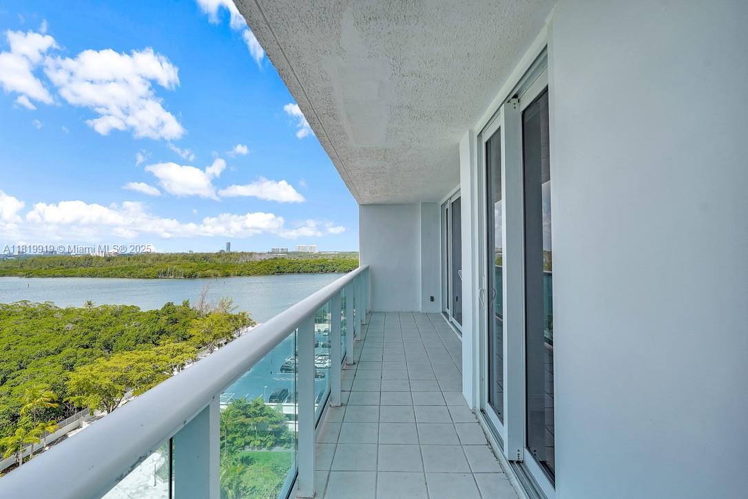 100 Bayview Drive, Unit 1223 Sunny Isles Beach, FL 33160 - Photo 16 of 34 a view of balcony with lake and mountain view