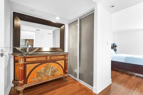 a living room with a sink furniture and a window