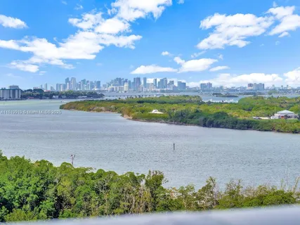 a view of a lake with a big yard