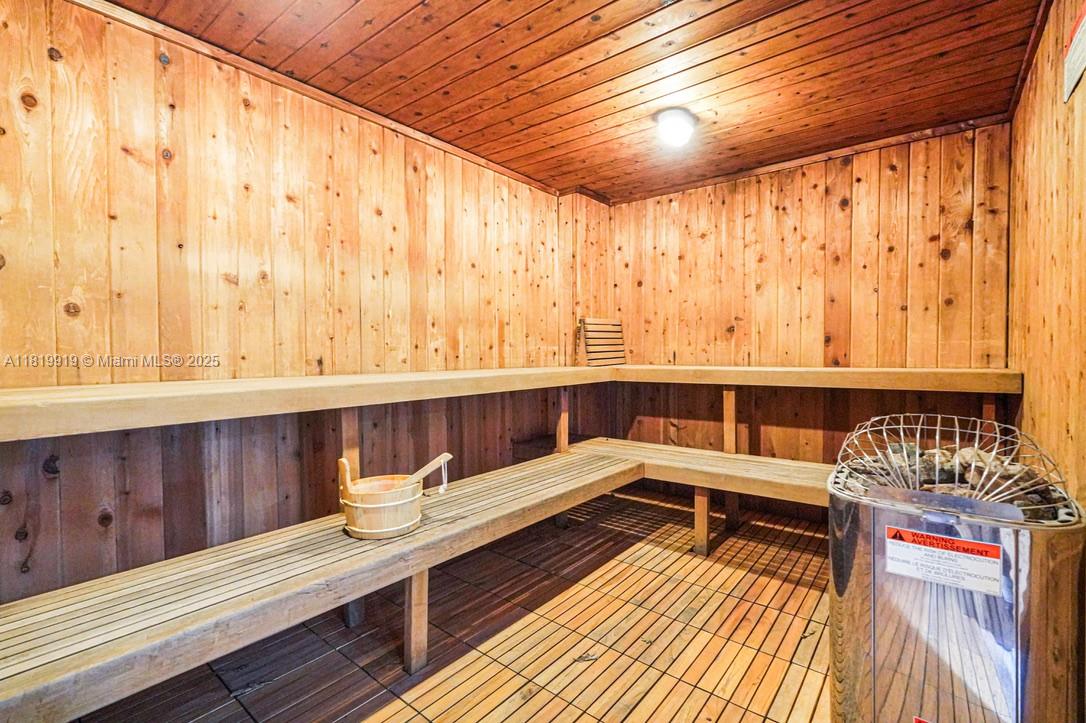 100 Bayview Drive, Unit 1223 Sunny Isles Beach, FL 33160 - Photo 31 of 34 a view of a wooden bench and bench