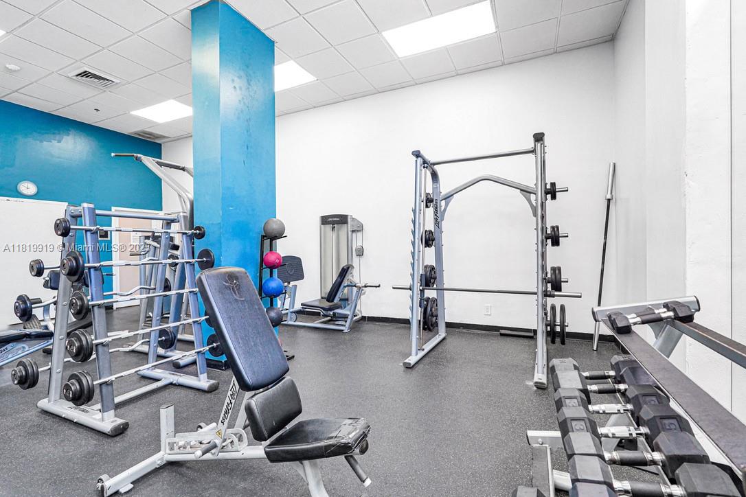100 Bayview Drive, Unit 1223 Sunny Isles Beach, FL 33160 - Photo 33 of 34 a view of a room with gym equipment