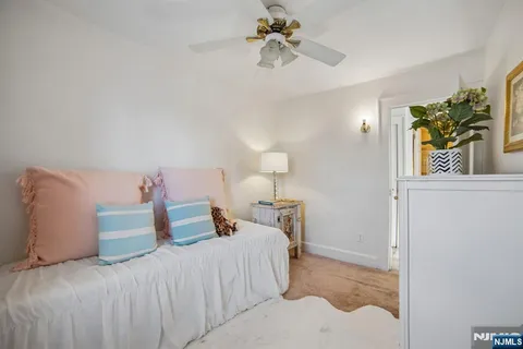 a view of an empty room and stairs