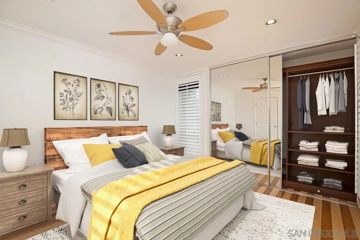 2510 Torrey Pines Road, Unit 408 La Jolla, CA 92037 - Photo 5 of 15 a bedroom with a bed a dresser and a window