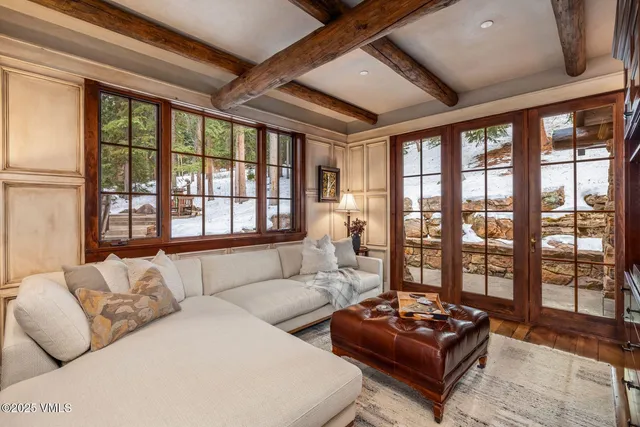 a view of a living room and kitchen