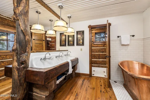 a view of a refrigerator and cabinets