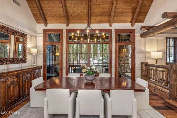 a dining room with large window