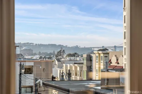 a view of a city with tall buildings