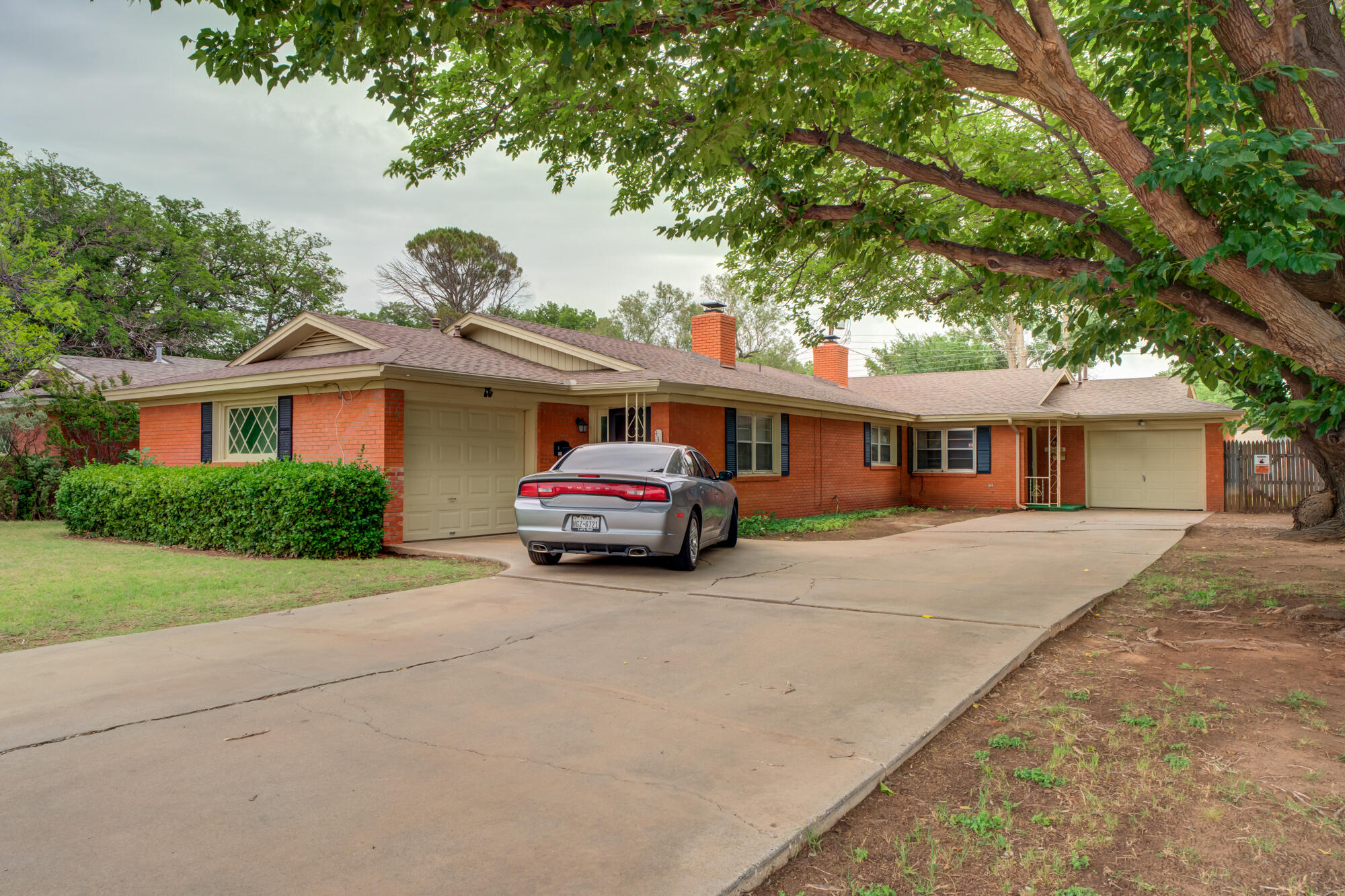 4309 58th Street Lubbock, TX 79413 - Photo 1 of 1 a car parked in front of house
