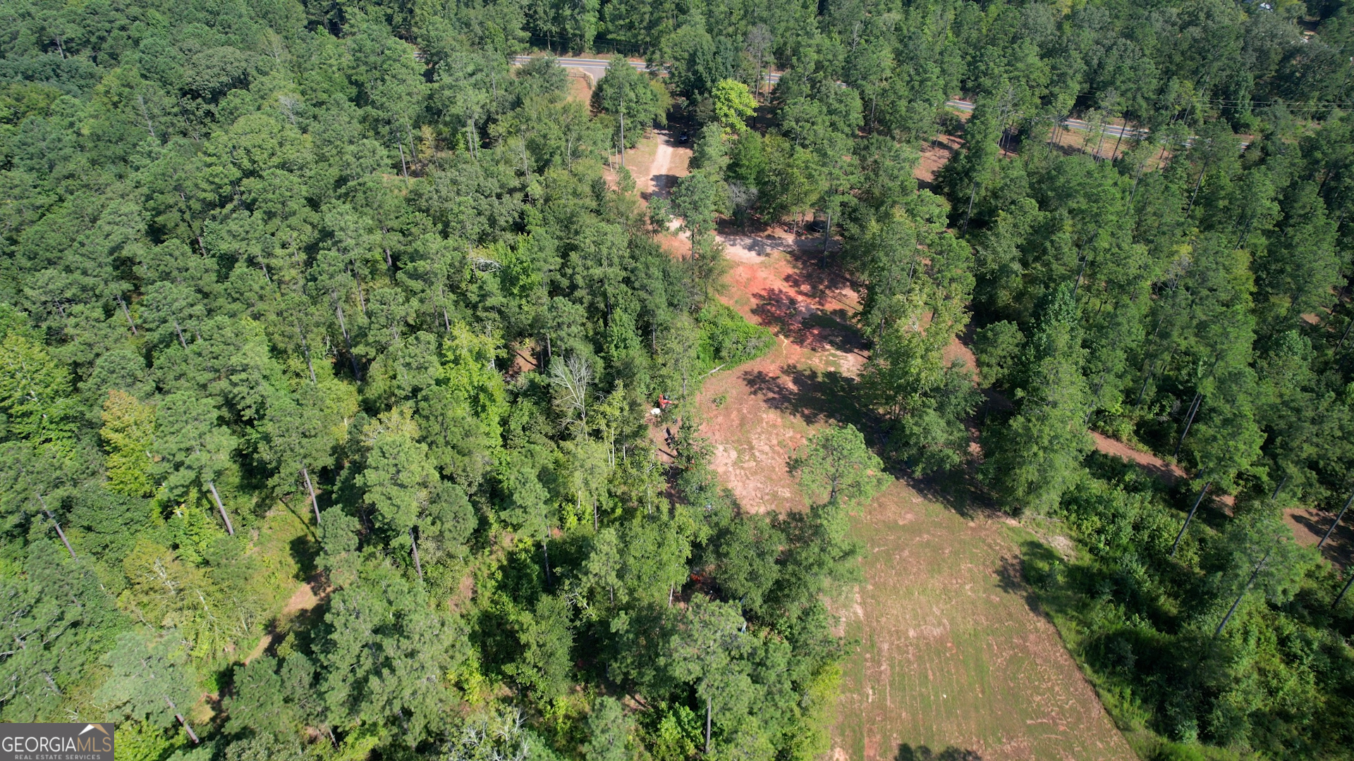 940 Newton Factory Bridge Road Covington, GA 30014 - Photo 42 of 58 an aerial view of residential house with outdoor space and trees all around