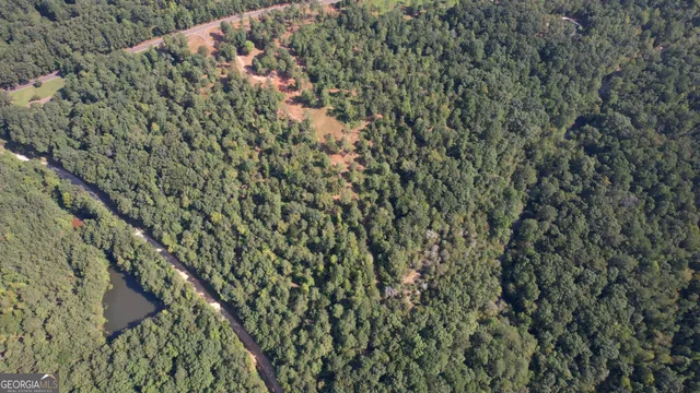 an aerial view of house with outdoor space