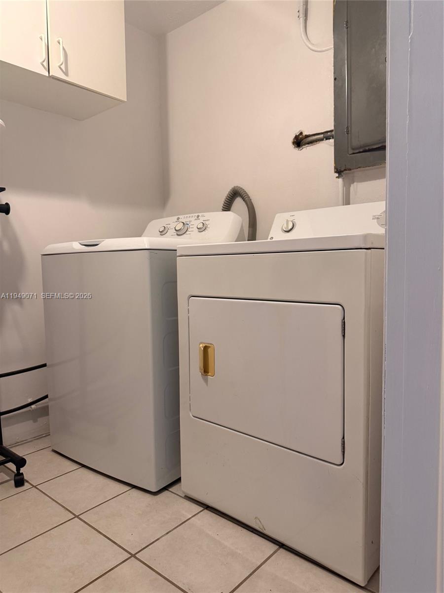 3709 Grand Concourse Sebring, FL 33875 - Photo 31 of 74 a utility room with dryer and washer