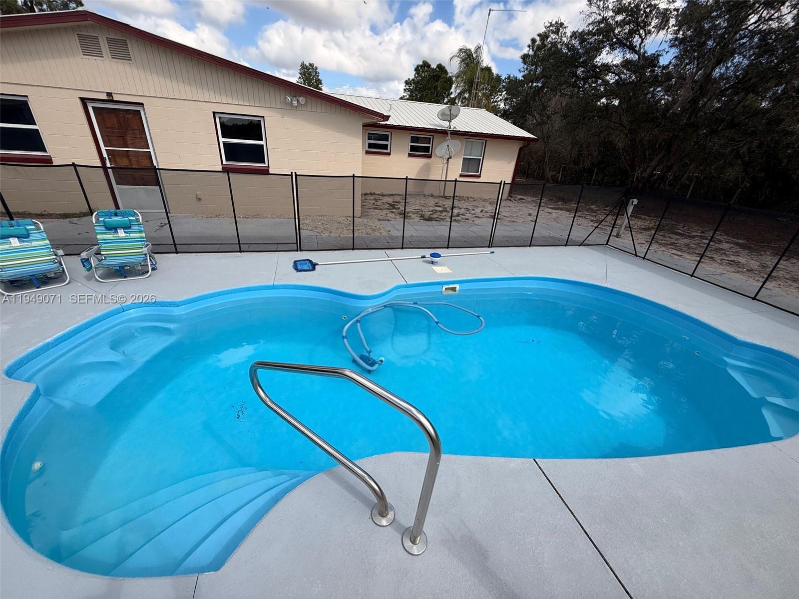 3709 Grand Concourse Sebring, FL 33875 - Photo 33 of 74 a view of a house with a swimming pool
