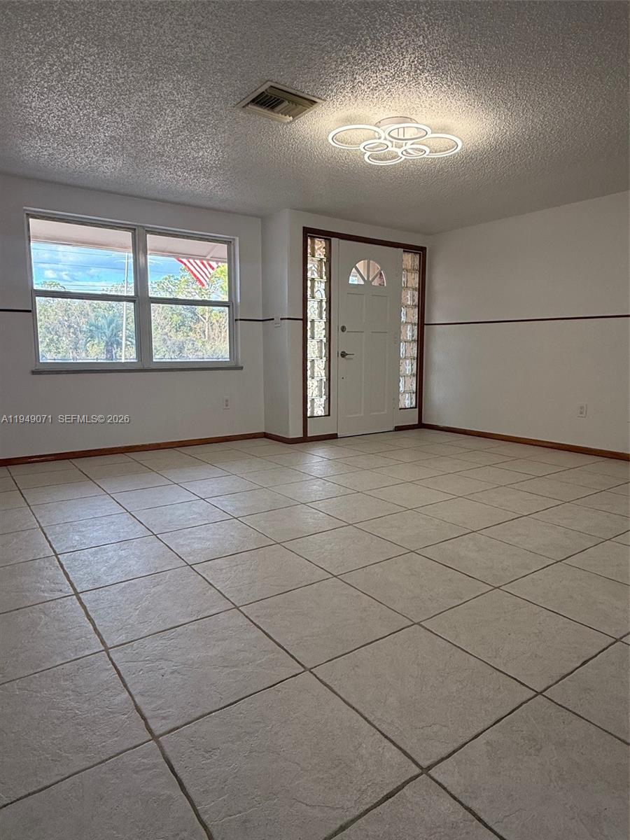 3709 Grand Concourse Sebring, FL 33875 - Photo 7 of 74 a view of an empty room with a window