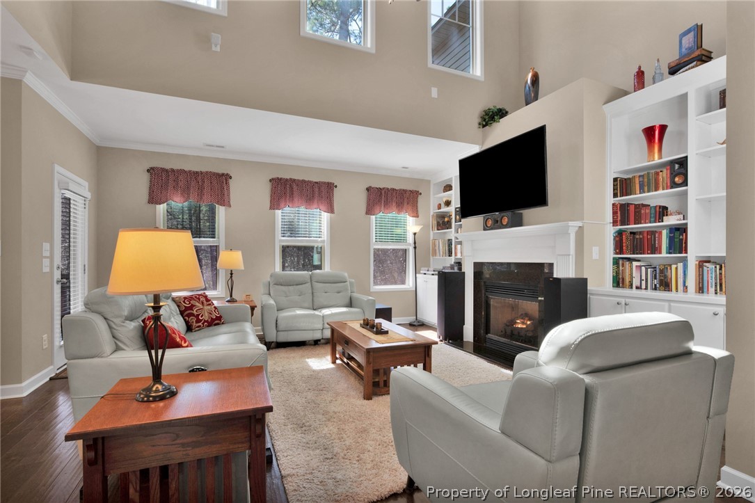 207 Pinetop Drive Carthage, NC 28327 - Photo 11 of 50 a living room with fireplace furniture and a flat screen tv
