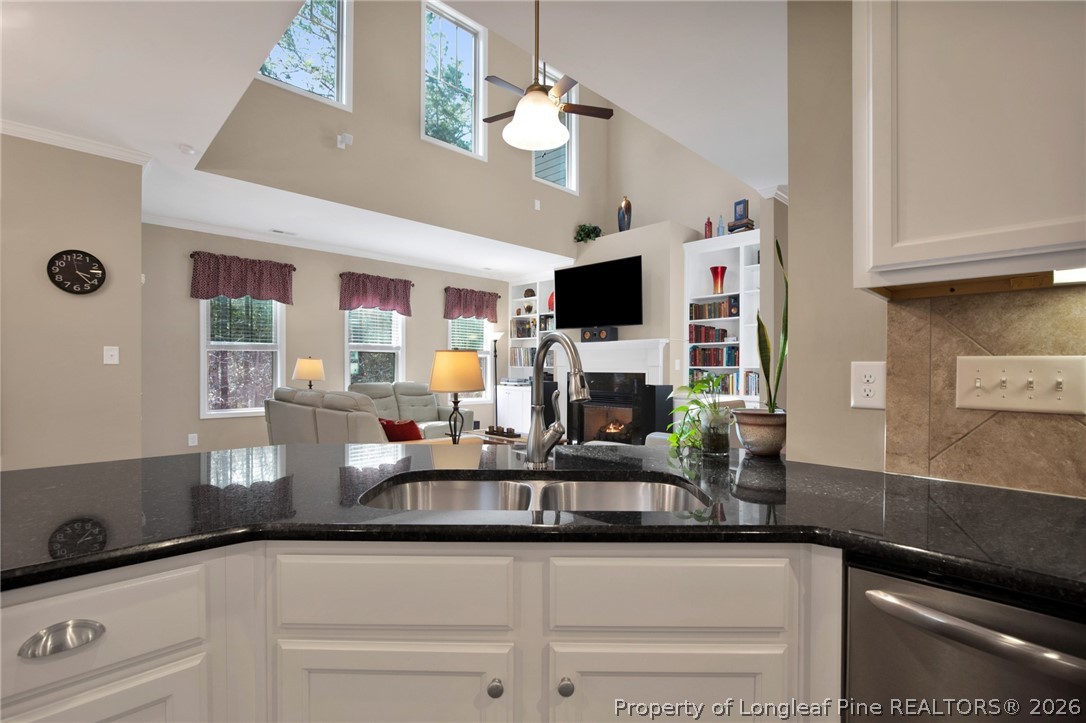 207 Pinetop Drive Carthage, NC 28327 - Photo 15 of 50 a kitchen with stainless steel appliances granite countertop a sink and a white cabinets